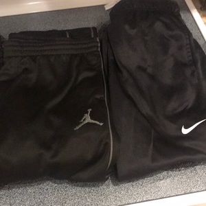 Three boys Nike athletic pants